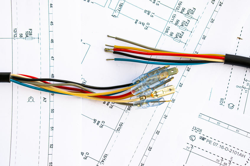 electrical wires with terminals lie on electrical circuits